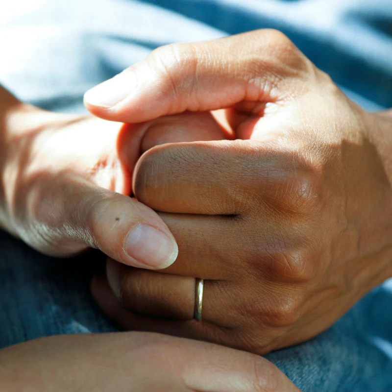 Couple Clasping Hands